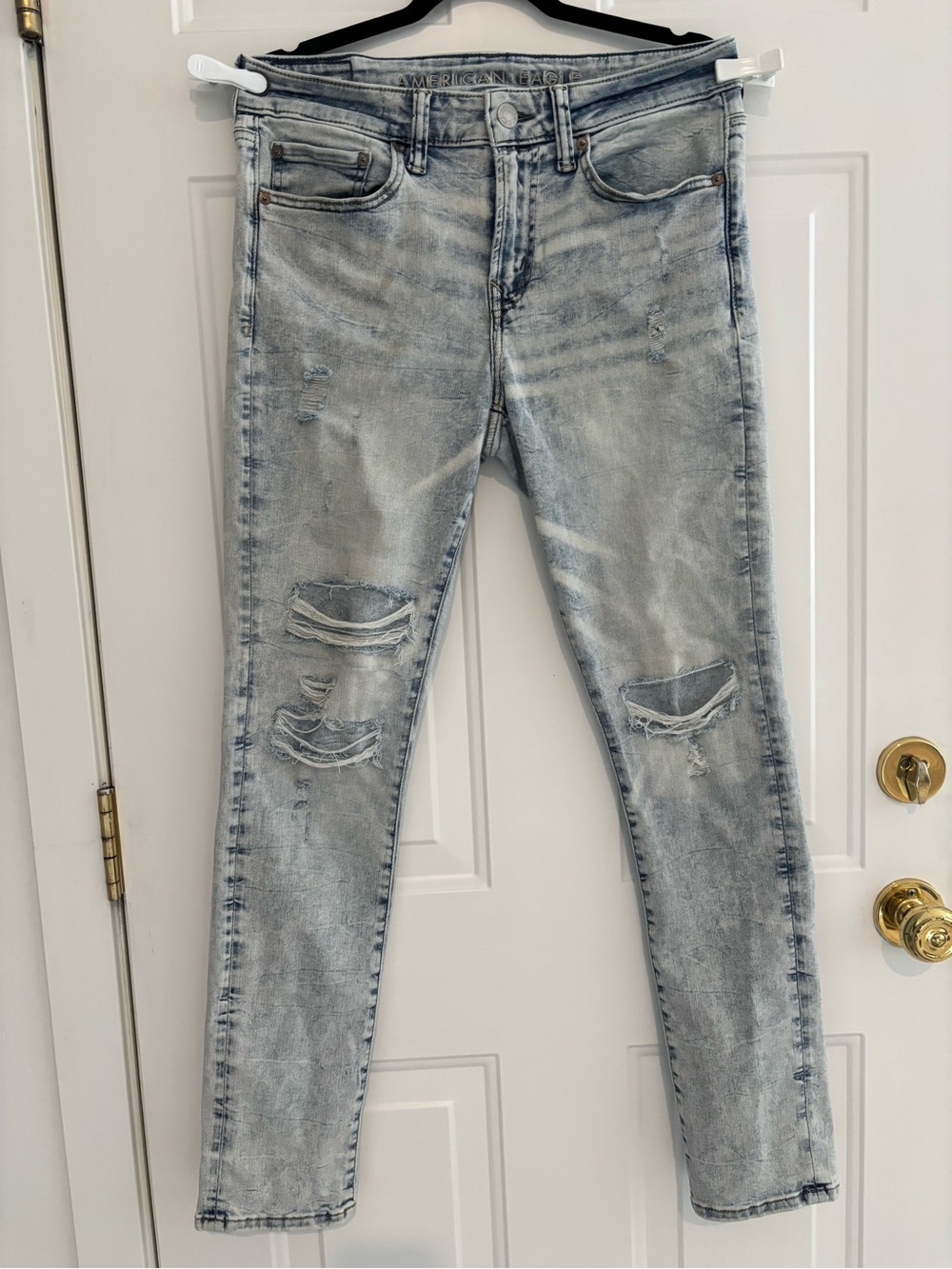 American Eagle Outfitters Light Wash Ripped Slim Jeans